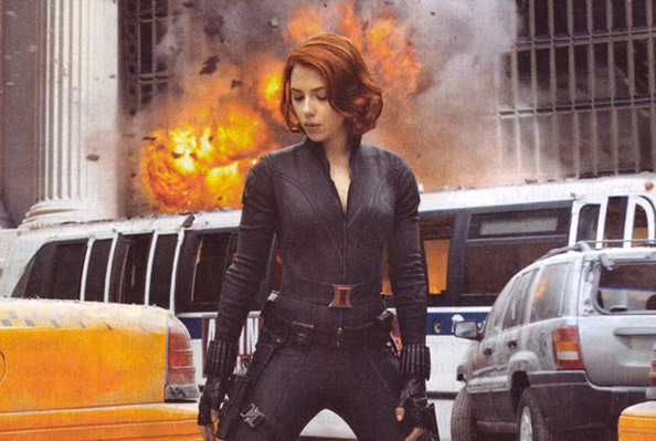 Scarlett Johansson chillin in front of some explosions