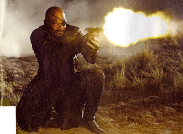 Sam Jackson shooting a pistol with a massive muzzle flare